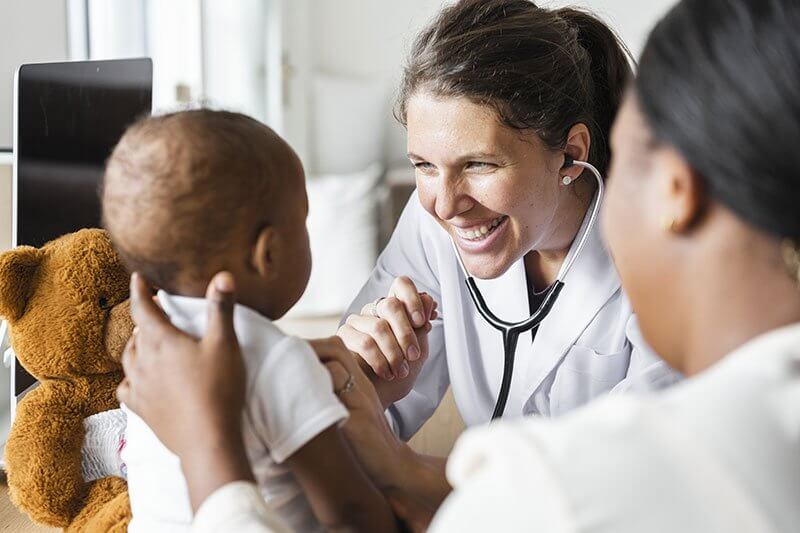 A relaxed pediatric doctor who uses Call 4 nurse triage services.