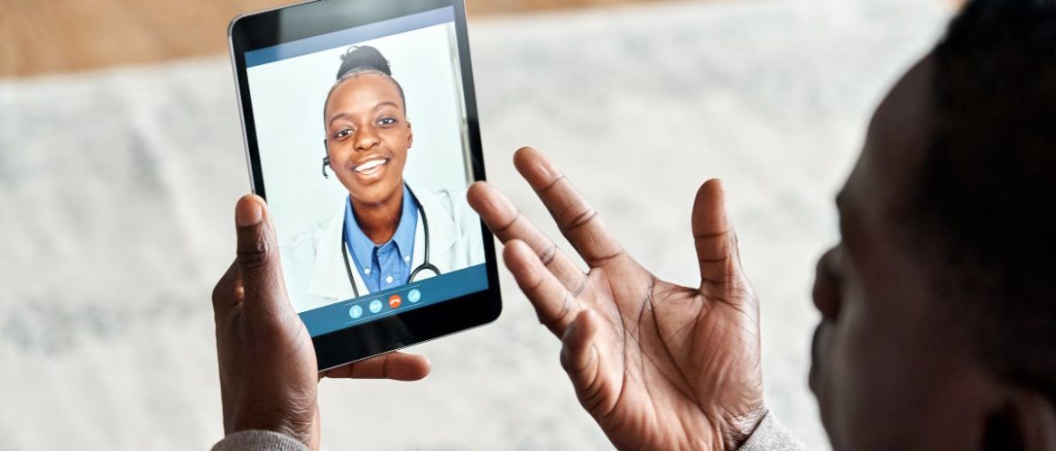 Doctor consulting with patient remotely
