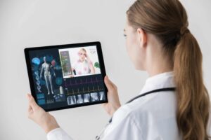 Doctor holding tablet to review report