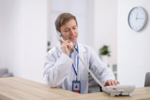 Medical assistant answering phone